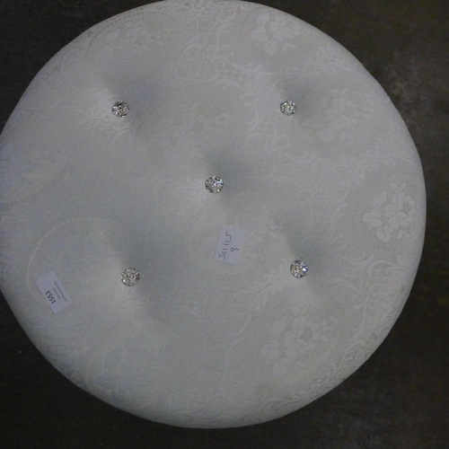 1553 - A white upholstered footstool *This lot is subject to VAT