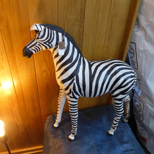 1566 - A leather wrapped zebra figure (slight damage)