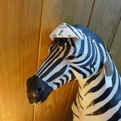 1566 - A leather wrapped zebra figure (slight damage)