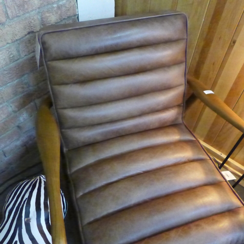 1567 - A Ribble brown leather armchair