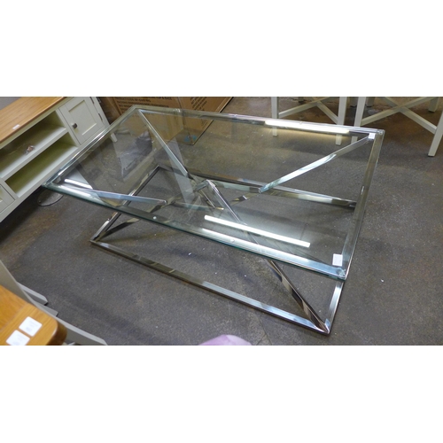 1575 - A chrome and glass rectangular coffee table *This lot is subject to VAT