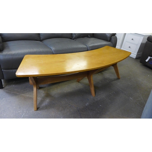 1589 - A teak effect curved coffee table