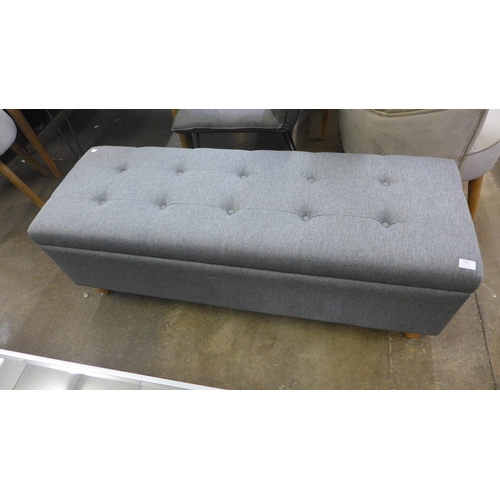 1599 - A Blaby grey fabric ottoman