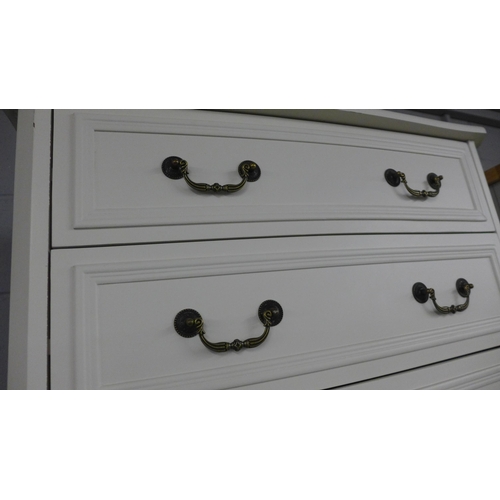 1616 - A white antique style three drawer chest