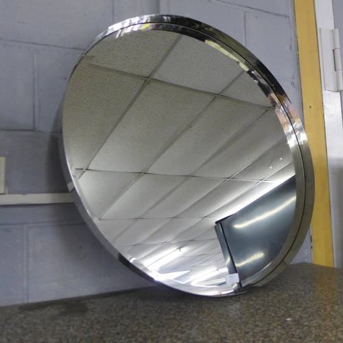 1621 - A circular chrome mirror