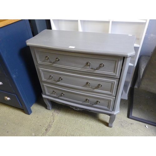 1637 - A grey three drawer chest - damaged