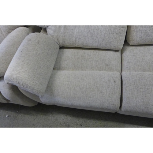 1663 - A light grey fabric three seater sofa and armchair