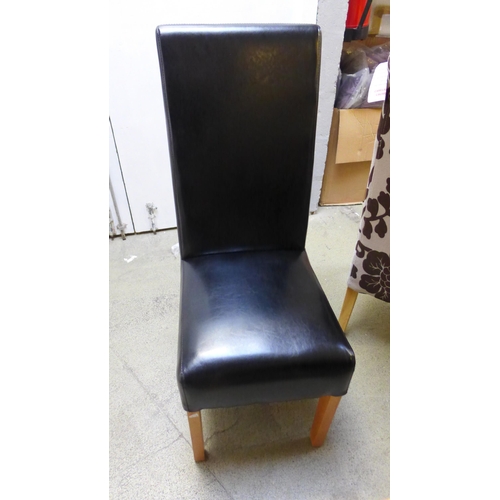 1666 - A square table and two leather effect dining chairs