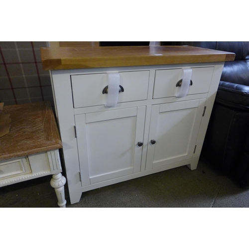 1671 - A Hampshire white painted and oak standard sideboard - damaged*This lot is subject to VAT