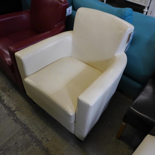 1686 - A single white leather effect armchair