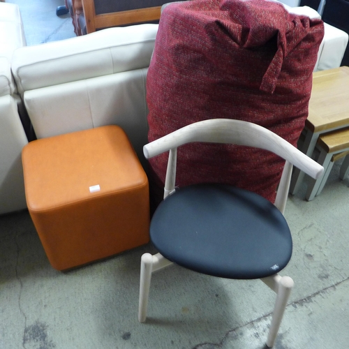 1697 - An upholstered bean bag, wooden side chair and orange leather effect stool