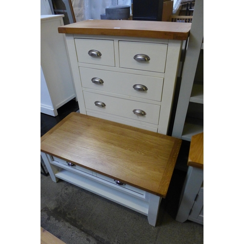 1706 - A Hampshire white painted and oak two over four chest and a coffee table (Damaged) *This lot is subj... 