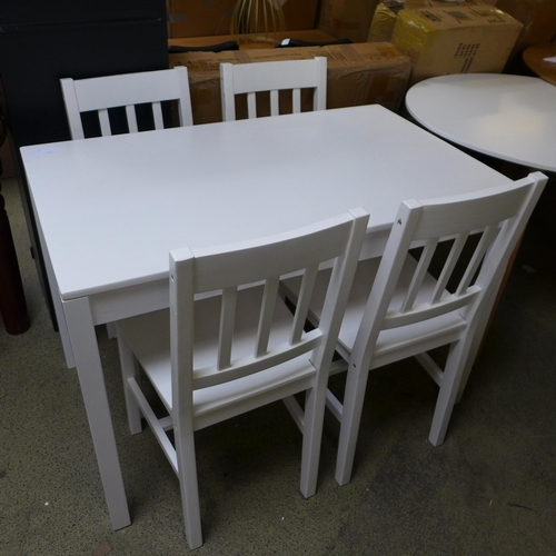 1723 - A white painted dining table and chairs * this lot is subject to VAT