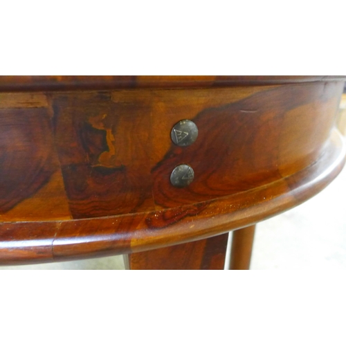 1724 - An Indian hardwood circular table, uneven *This lot is subject to VAT