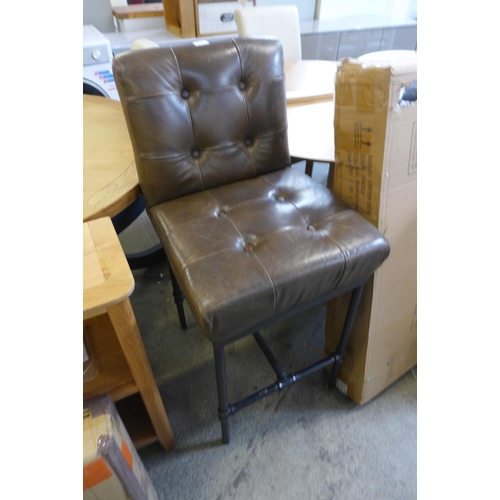 1734 - A Union buttoned back bar stool (damaged back)