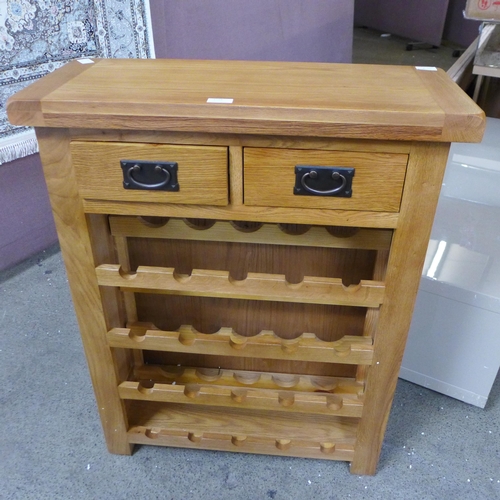 1758 - An oak wine rack (damaged back panel) *This lot is subject to VAT