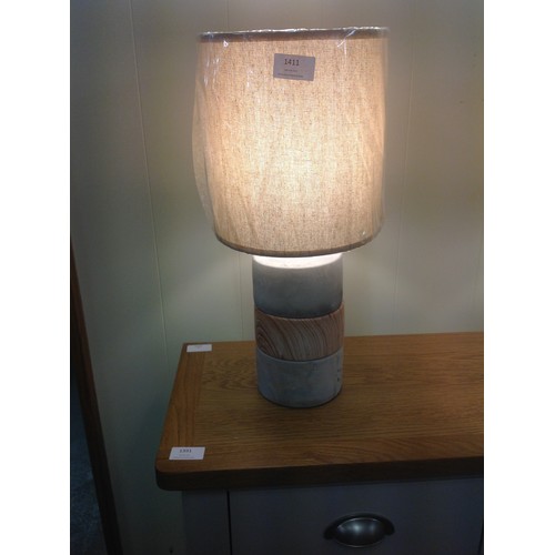 1411 - A concrete base table lamp with a decorative wooden band with linen shade, H 44cms (70376623)   #