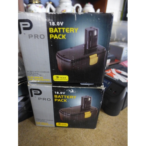 2245 - P Performance Pro battery charger with 4 battery packs: 2 x 18v, 2 x 14v - all W boxed