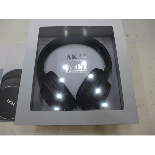 2263 - 2 Pairs of Akai headphones - unused - W boxed