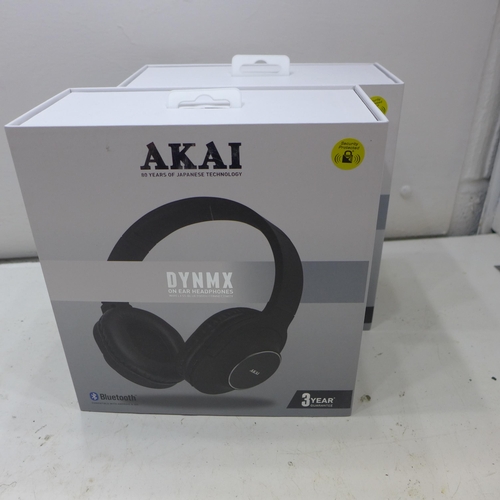 2264 - 2 Pairs of Akai headphones - unused - W boxed