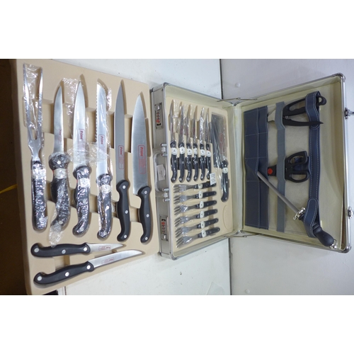 2328 - A Prima set of knives, cased