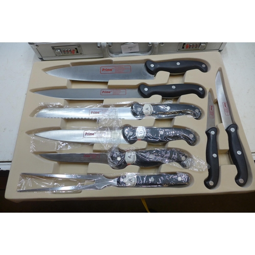 2328 - A Prima set of knives, cased