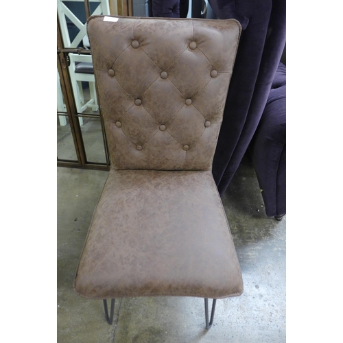 1542 - A brown leather button back side chair