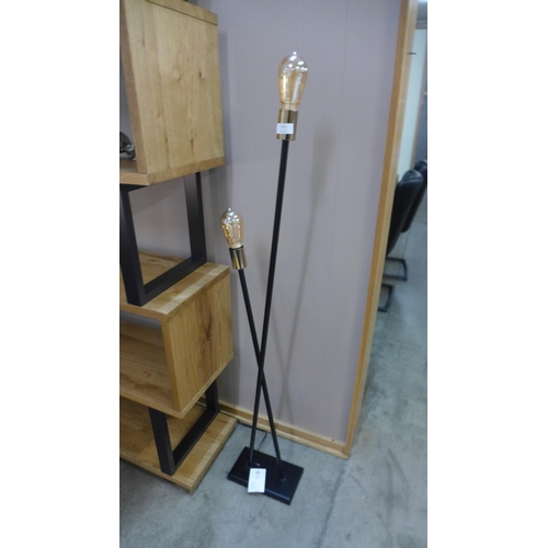 1337 - A black filament crossover floor lamp, H 127cms (27938)   #