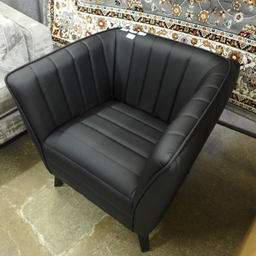 1350 - A Delph black upholstered tub chair