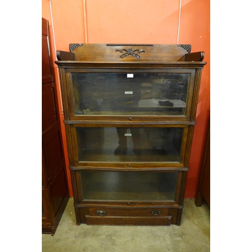 36 - An early 20th Century Globe Wernicke mahogany three tier sectional stacking bookcase