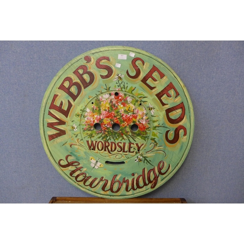 426 - A painted wooden Webbs Seeds advertising sign