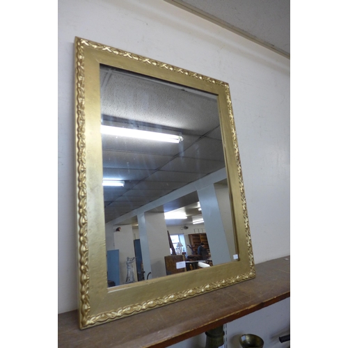 436 - A gilt framed mirror