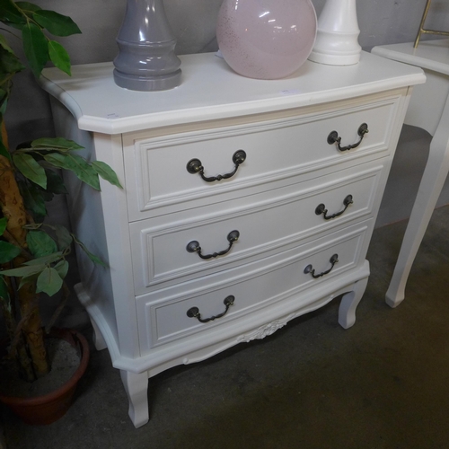 1506 - A white three drawer french style chest