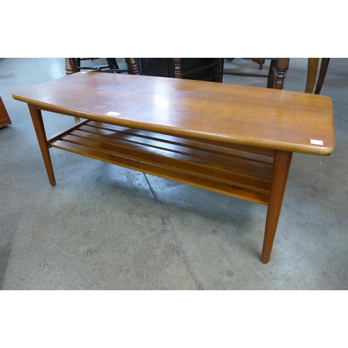 100 - A teak coffee table