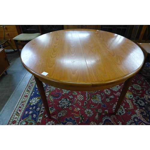 103a - A G-Plan Fresco teak extending dining table