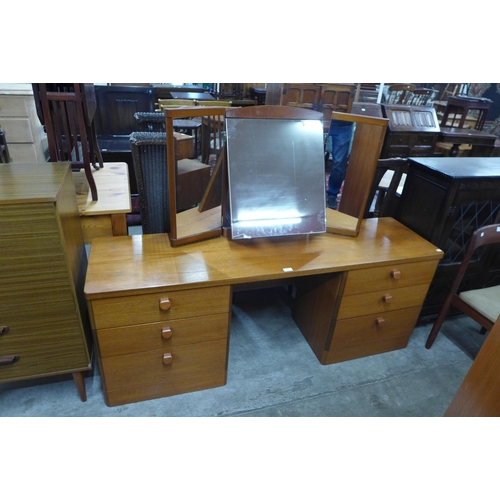 106 - A Stag Catanta teak dressing table