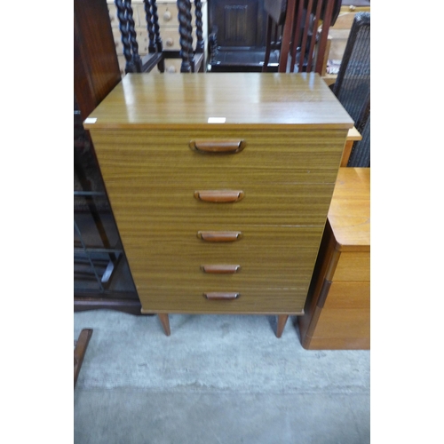 107 - A simulated teak chest of drawers