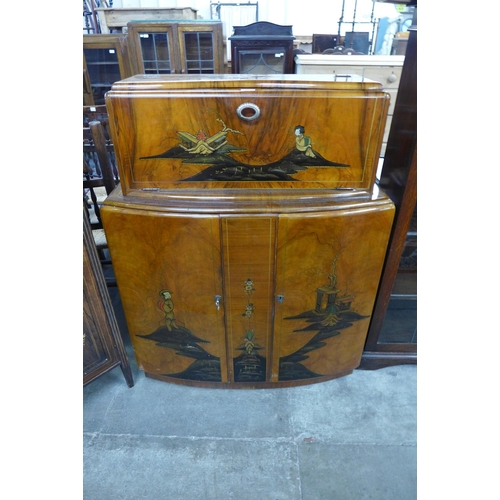 109 - A Japanned walnut cocktail cabinet