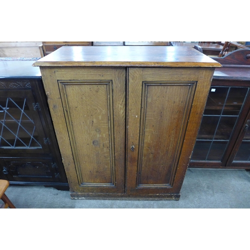 112 - A Victorian pine two door kitchen cupboard