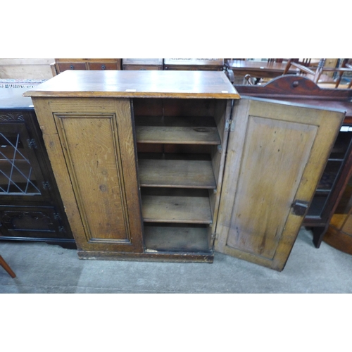 112 - A Victorian pine two door kitchen cupboard