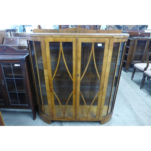 114 - A walnut two door display cabinet