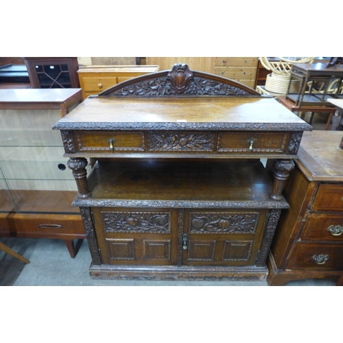 117 - A Victorian carved oak buffet