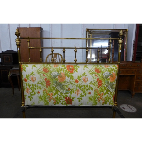 122 - A Victorian brass double bed