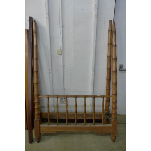 123 - An early 20th Century beech full tester bed, approx. 214cms h, 123cms w, 109cms l