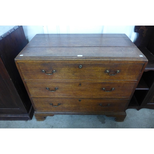 131 - A George III oak chest of drawers