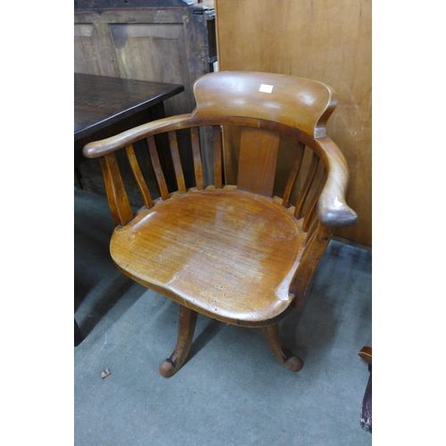 137 - An Edward VII mahogany revolving Captain's desk chair