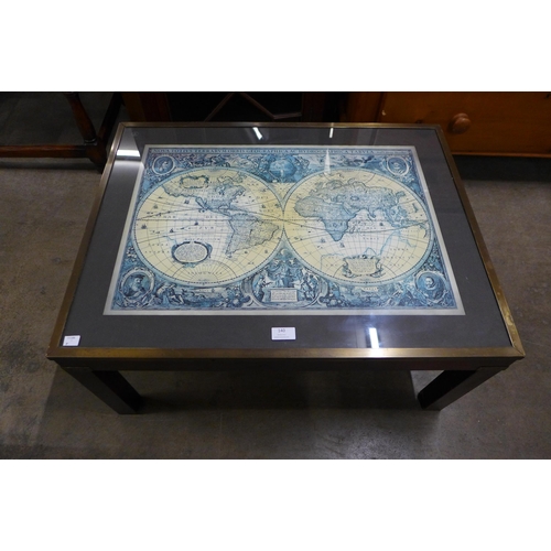 140 - A mahogany and brass mounted Atlas topped coffee table