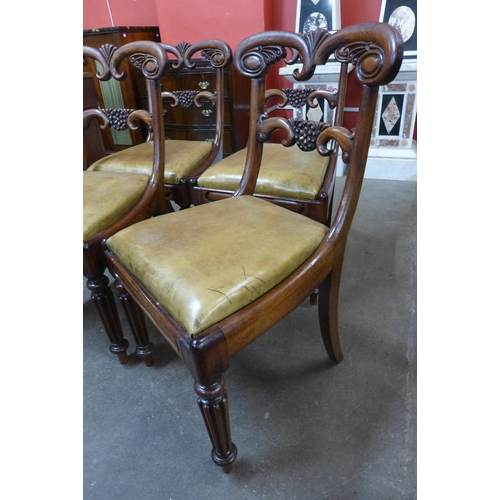 31 - A set of four Regency carved mahogany dining chairs