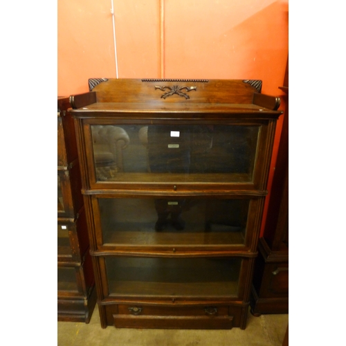 36 - An early 20th Century Globe Wernicke mahogany three tier sectional stacking bookcase