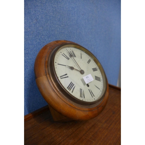 403 - A Victorian mahogany circular wall clock